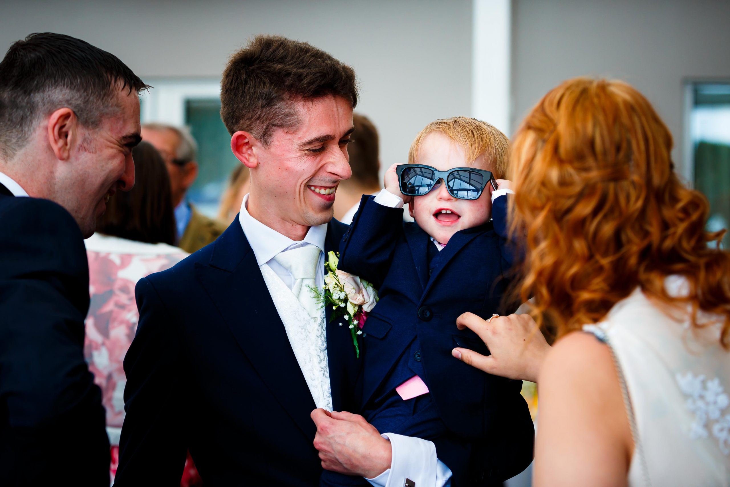 Horsley lodge wedding photography - Page boy and flower girl holding hands
