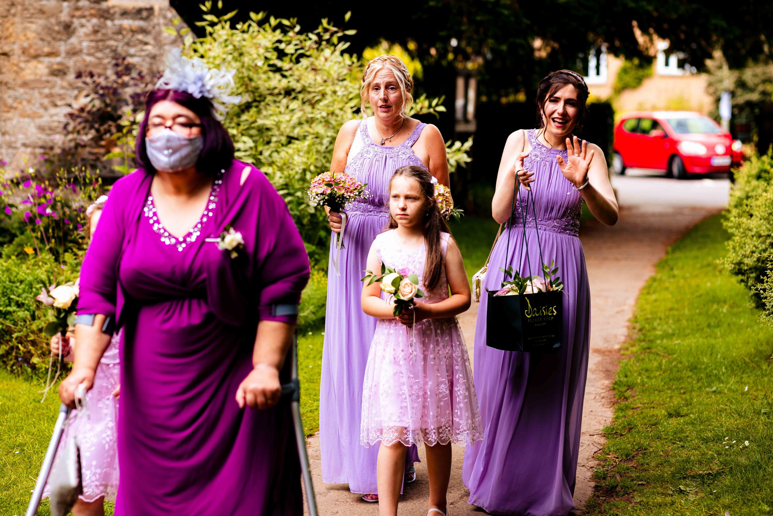 Bridesmaids arriving at church