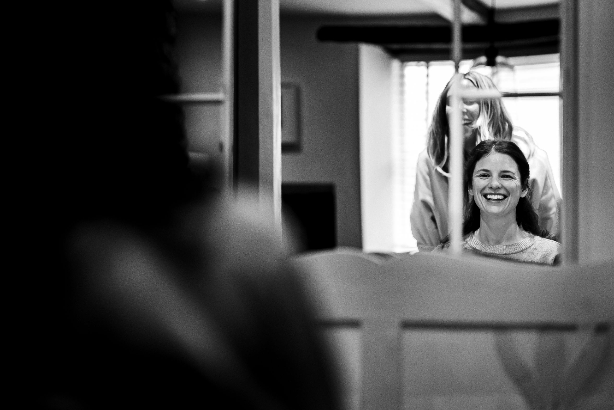 Hadsham Farm Wedding Photography 0007 Reflection of bridge having her hair done in the mirror